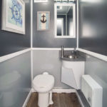 image displays the interior of a luxury portable restroom trailer